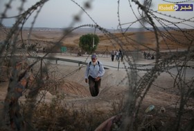 معاناة العمال الفلسطينين