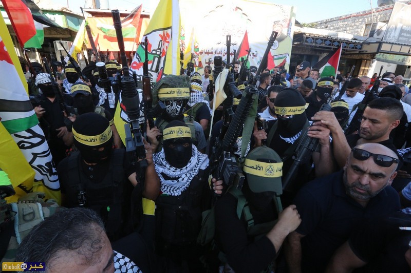 "فتح" تنظم مسيرة مسلحة دعما للرئيس واسنادا للقدس والشرعية الفلسطينية في حلحول شمال الخليل